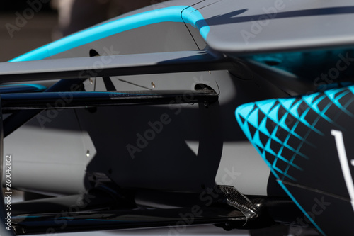 Rome, Italy 2019, March 30th. E-Prix, Formula E. Details of hihg speed electric racing car, carbon and fibreglass textures, blue paint. Extreme sports, design concept, automotive luxury games.