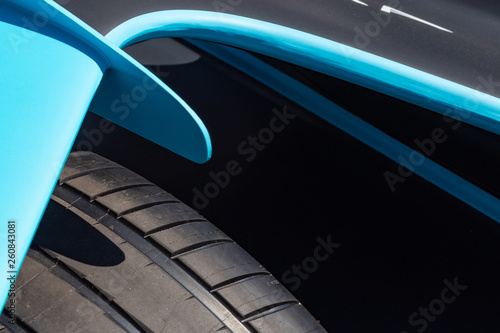 Rome, Italy 2019, March 30th. E-Prix, Formula E. Details of hihg speed electric racing car, carbon and fibreglass textures, blue paint. Extreme sports, design concept, engineered rubber tires. photo