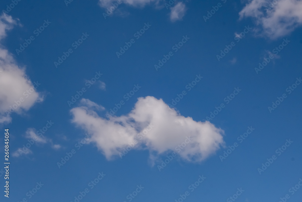 Clouds against the blue sky.