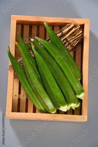 green peas in a bowl on wooden table