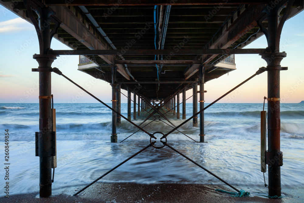 Under a Pier on the coast facing out to sea