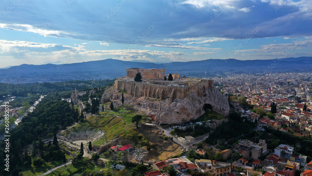 Aerial drone bird's eye view photo of iconic Acropolis hill, the Parthenon and famous theatre of Dionysus, Athens historic centre, Attica, Greece