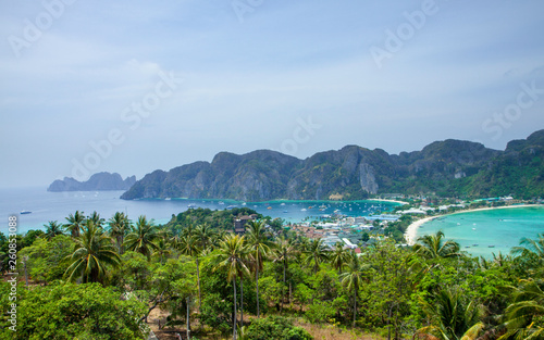 Beautiful view of the island with thin isthmus and two bays. Green mountains and tropic plants. Tropical island in the ocean, Phi-Phi island. Thailand. © Nataly