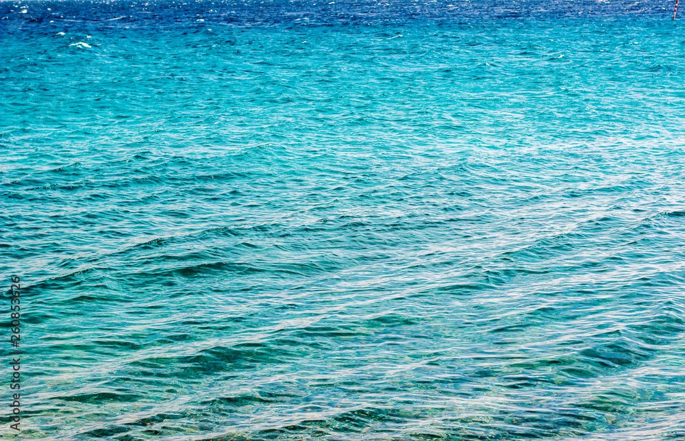 Obraz premium vivid blue colorful summer Red sea perspective water surface natural background concept 