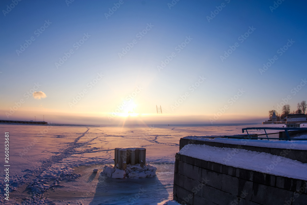 Frosty morning on the Baltic sea. Industrial winter landscape