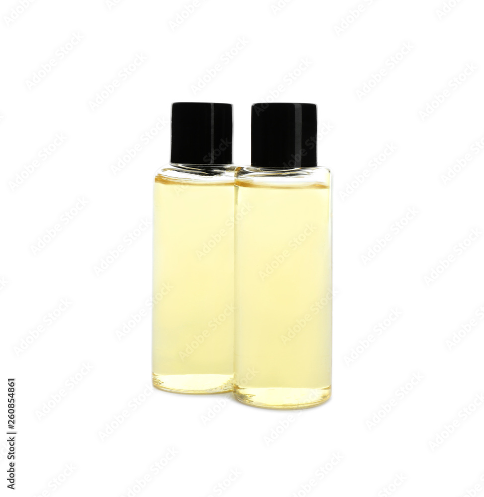 Mini bottles with cosmetic products on white background. Hotel amenities Mini bottles with cosmetic products on white background. Hotel amenities