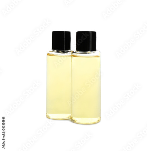 Mini bottles with cosmetic products on white background. Hotel amenities