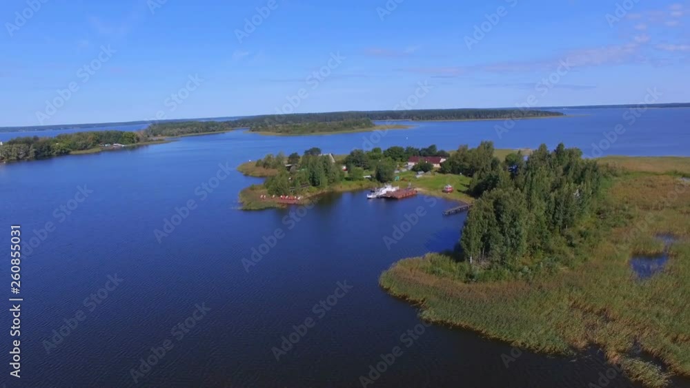 Aerial View Of An Island And Pier On Lake Seliger, Russia Aerial View Of An Island And Pier On Lake Seliger, Russia