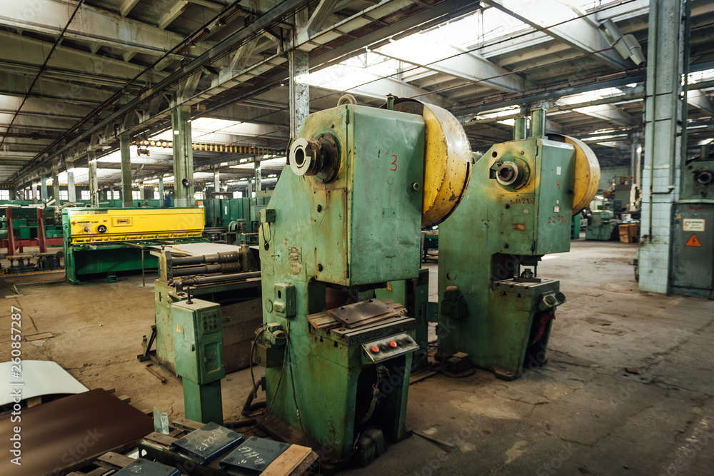 Old metalworking factory production line. Rusty machine tools Old metalworking factory production line. Rusty machine tools