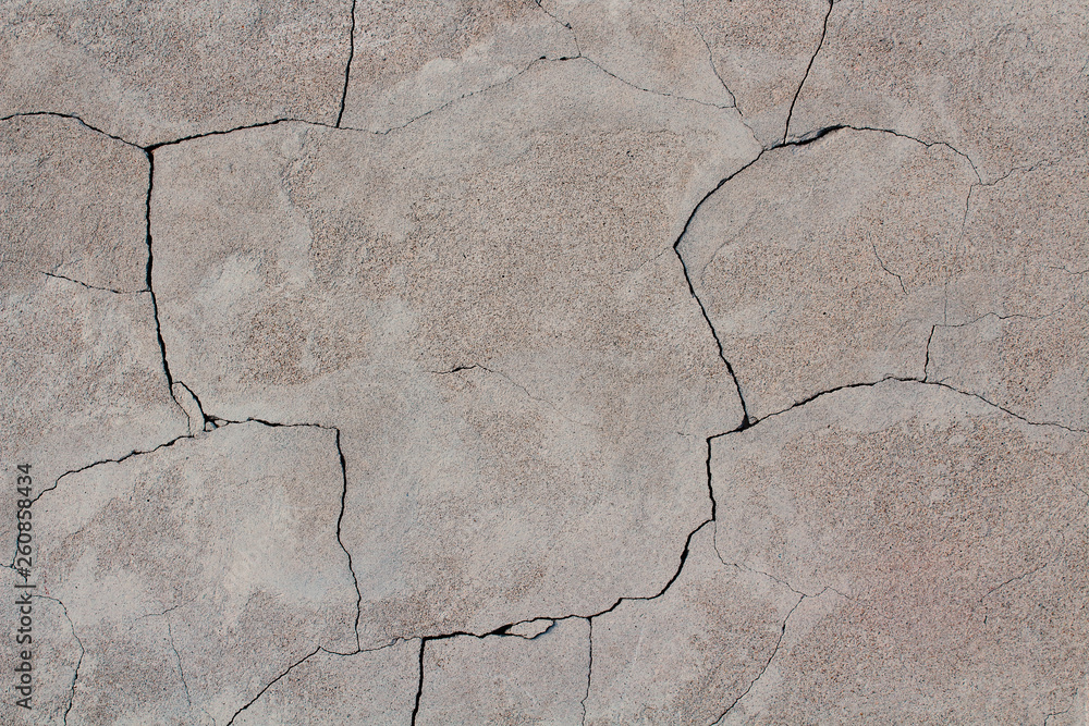 Obraz premium Cracked plaster on the wall. Close-up. Background. Texture.