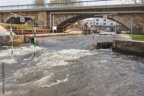 Kayak training, Kayak Race near the bridge where water strong whirlpools arise near the piles
