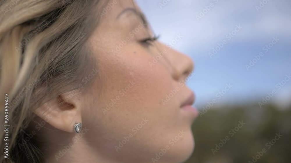 melancholy, loneliness. Face of sad attractive young woman-outdoor melancholy, loneliness. Face of sad attractive young woman-outdoor