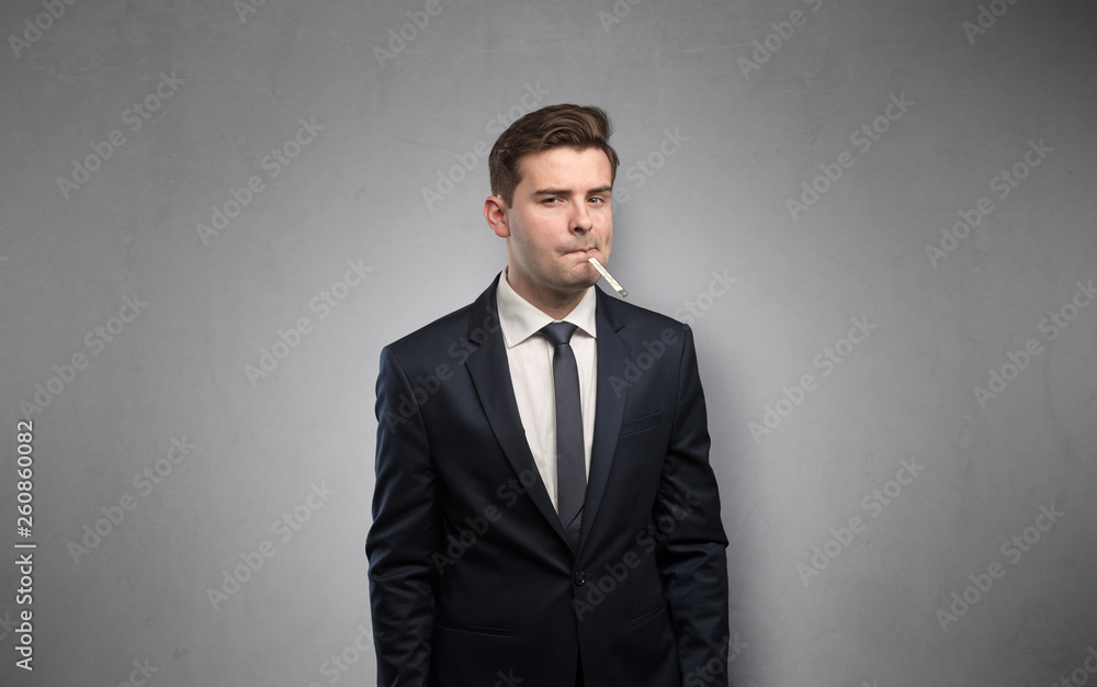 Young tired businessman with thermometer and copy space
Young tired businessman with thermometer and copy space