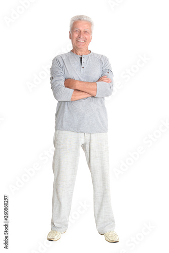 Portrait of senior man posing on white background, full length