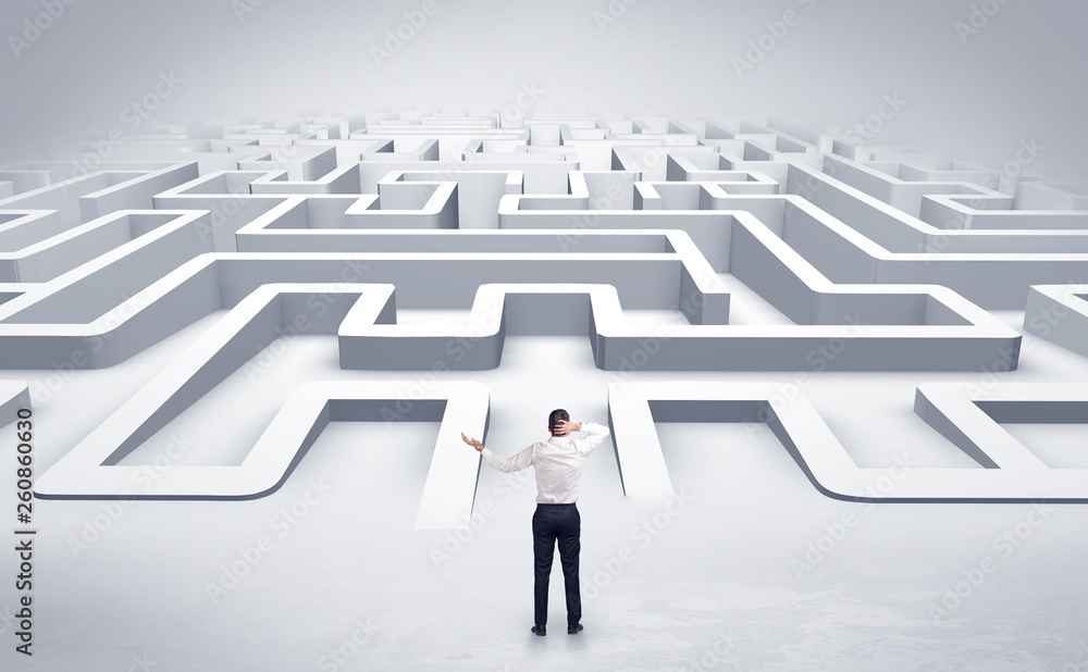 Businessman getting ready to enter a 3D flat labyrinth concept
Businessman getting ready to enter a 3D flat labyrinth concept