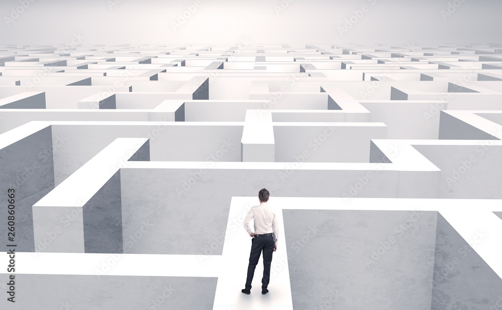 Small businessman in a middle of a huge maze
Small businessman in a middle of a huge maze