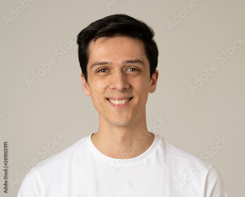Portrait of young attractive cheerful man with smiling happy face. Human expressions and emotions