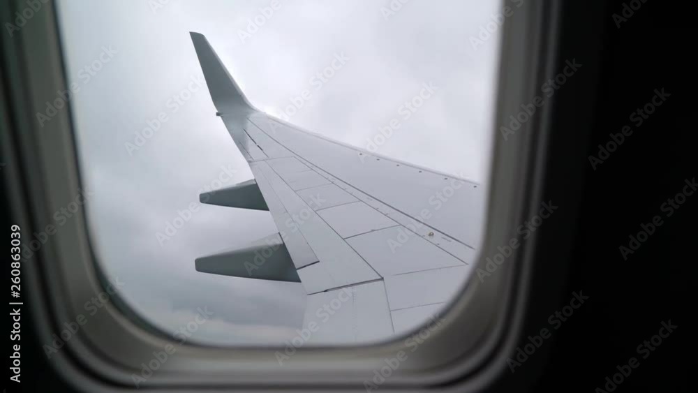 Airplane take off and flying, view from cabin window Airplane take off and flying, view from cabin window