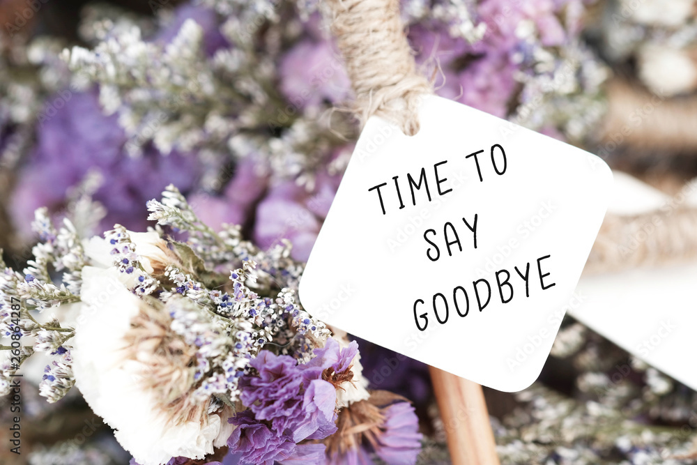 Time to say goodbye word on card and purple flower background. Stock Photo Adobe Stock