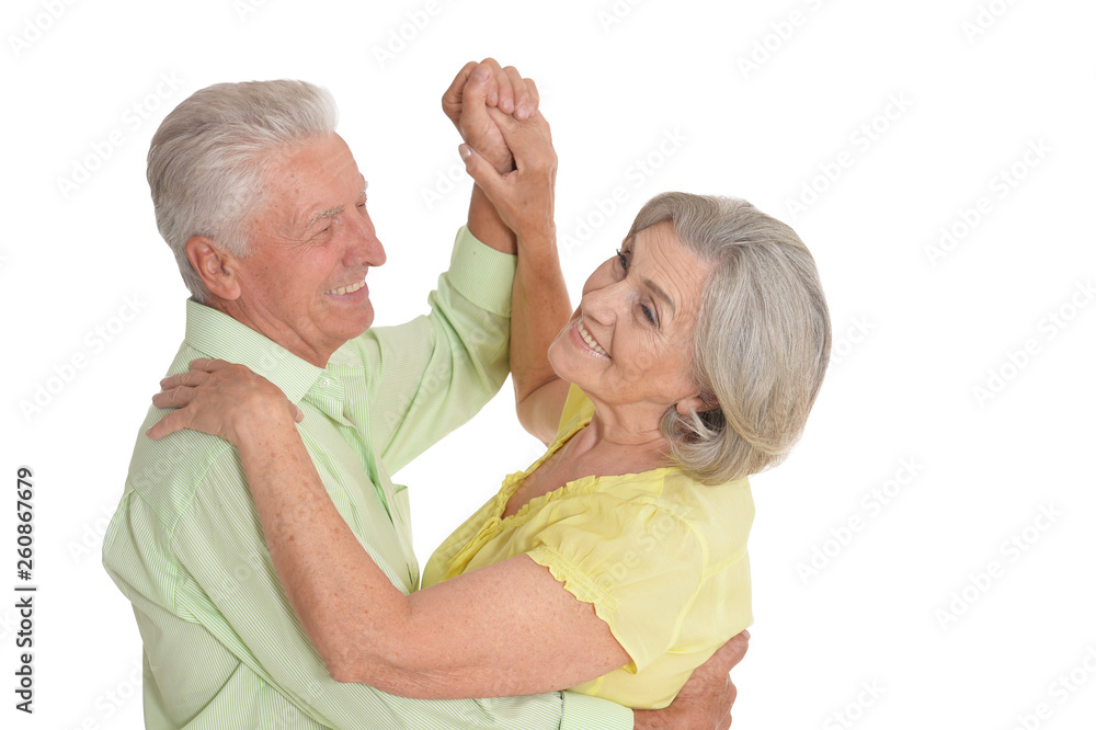 Portrait of senior couple dancing on white background Portrait of senior couple dancing on white background