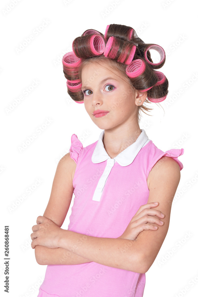 Portrait of emotional little pretty girl with hair curlers Portrait of emotional little pretty girl with hair curlers