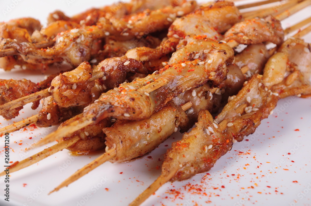 grilled chicken wings with sauce on plate