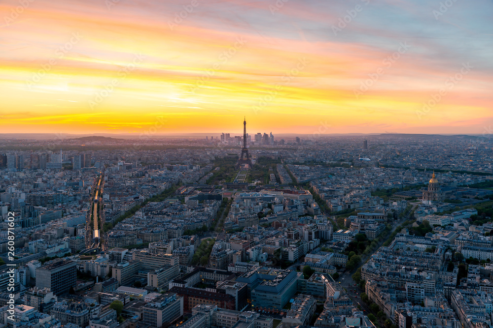 Aerial view of Paris and Eiffel tower at sunset in Paris, France.