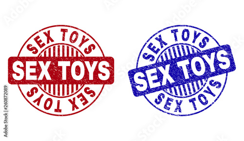 Grunge SEX TOYS round stamp seals isolated on a white background. Round seals with grunge texture in red and blue colors. Vector rubber overlay of SEX TOYS tag inside circle form with stripes.