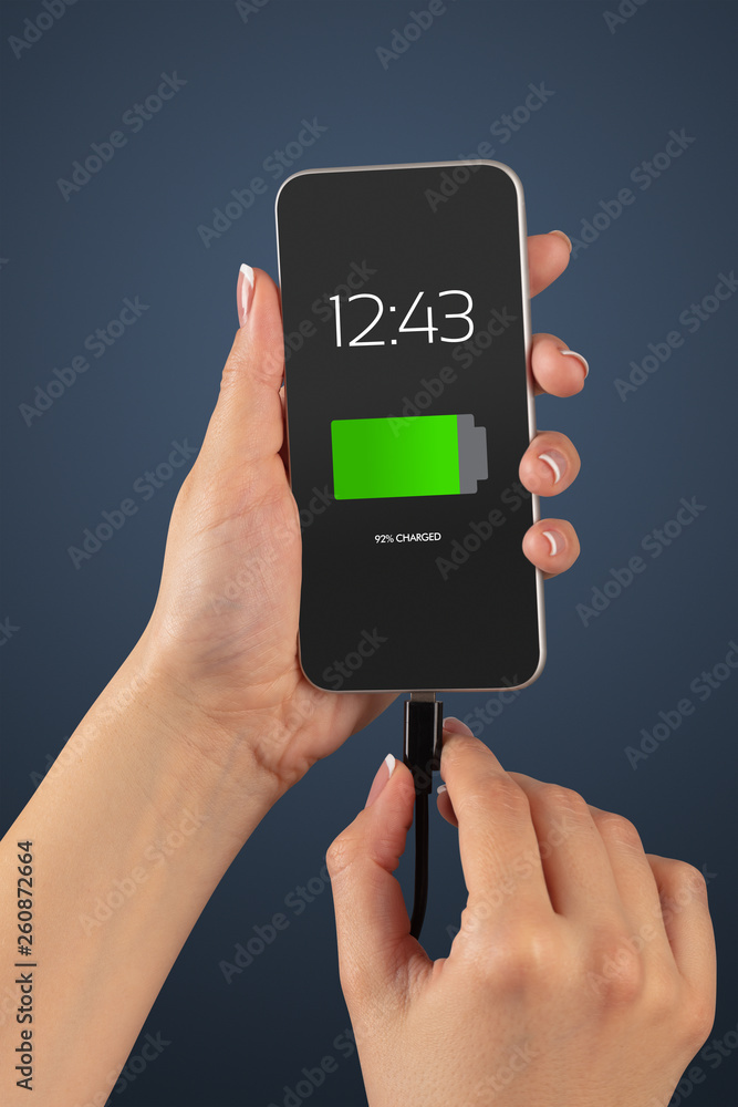 Elegant hand charging smartphone with low battery
Elegant hand charging smartphone with low battery
