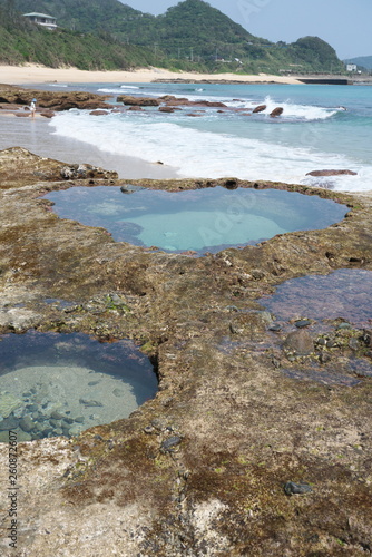 Heart-shaped tide pool at low tide at Akaogi district in Amami Oshima, Kagoshima, Japan