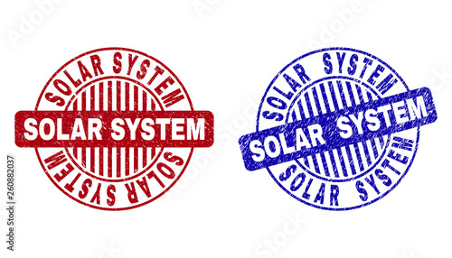 Grunge SOLAR SYSTEM round stamp seals isolated on a white background. Round seals with grunge texture in red and blue colors.
