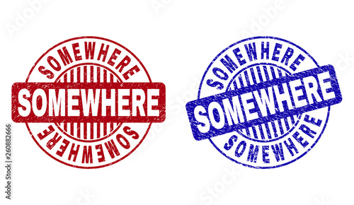Grunge SOMEWHERE round stamp seals isolated on a white background. Round seals with grunge texture in red and blue colors. Vector rubber imprint of SOMEWHERE caption inside circle form with stripes.