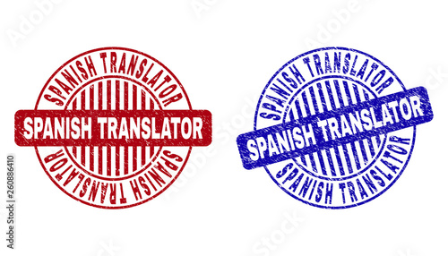 Grunge SPANISH TRANSLATOR round stamp seals isolated on a white background. Round seals with grunge texture in red and blue colors.