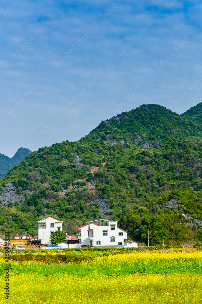 Countryside and mountain scenery with blue sky background Countryside and mountain scenery with blue sky background