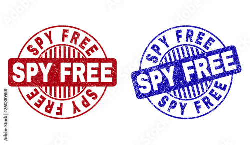Grunge SPY FREE round stamp seals isolated on a white background. Round seals with grunge texture in red and blue colors. Vector rubber overlay of SPY FREE caption inside circle form with stripes.
