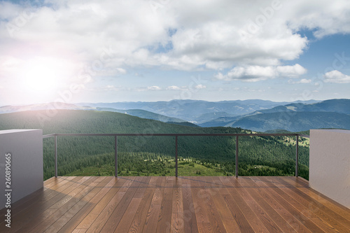 Balcony view of mountains. Landscape. Sunny Day. Terrace with a beautiful view. Background with beautiful landscape.