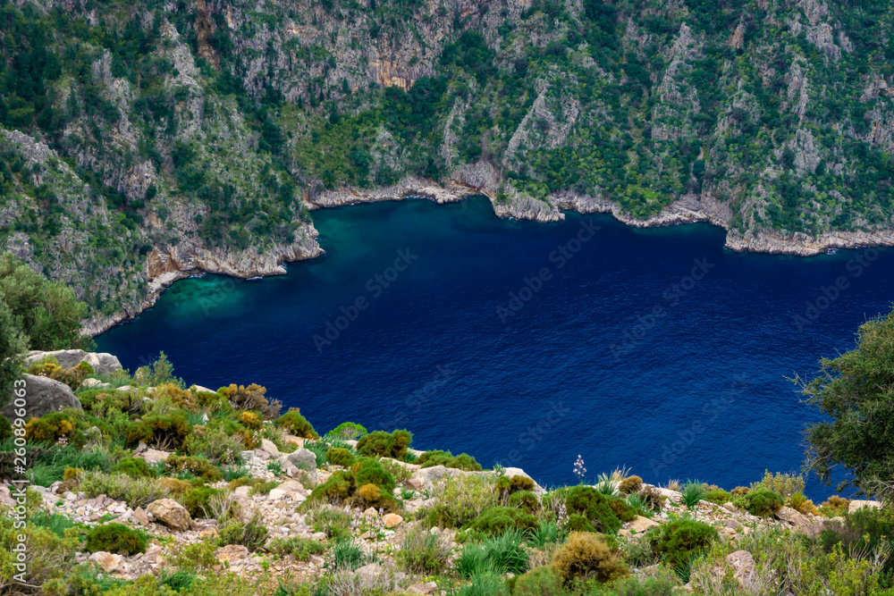 The high view of Butterfly valley deep gorge, Fethiye, Mugla, Turkey. Summer, sea and holiday concept. (Kelebekler Vadisi)