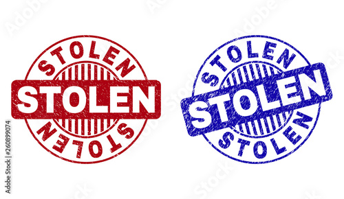 Grunge STOLEN round stamp seals isolated on a white background. Round seals with grunge texture in red and blue colors. Vector rubber watermark of STOLEN title inside circle form with stripes.