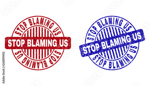 Grunge STOP BLAMING US round stamp seals isolated on a white background. Round seals with distress texture in red and blue colors.
