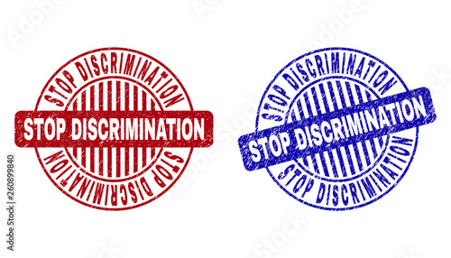 Grunge STOP DISCRIMINATION round stamp seals isolated on a white background. Round seals with grunge texture in red and blue colors.