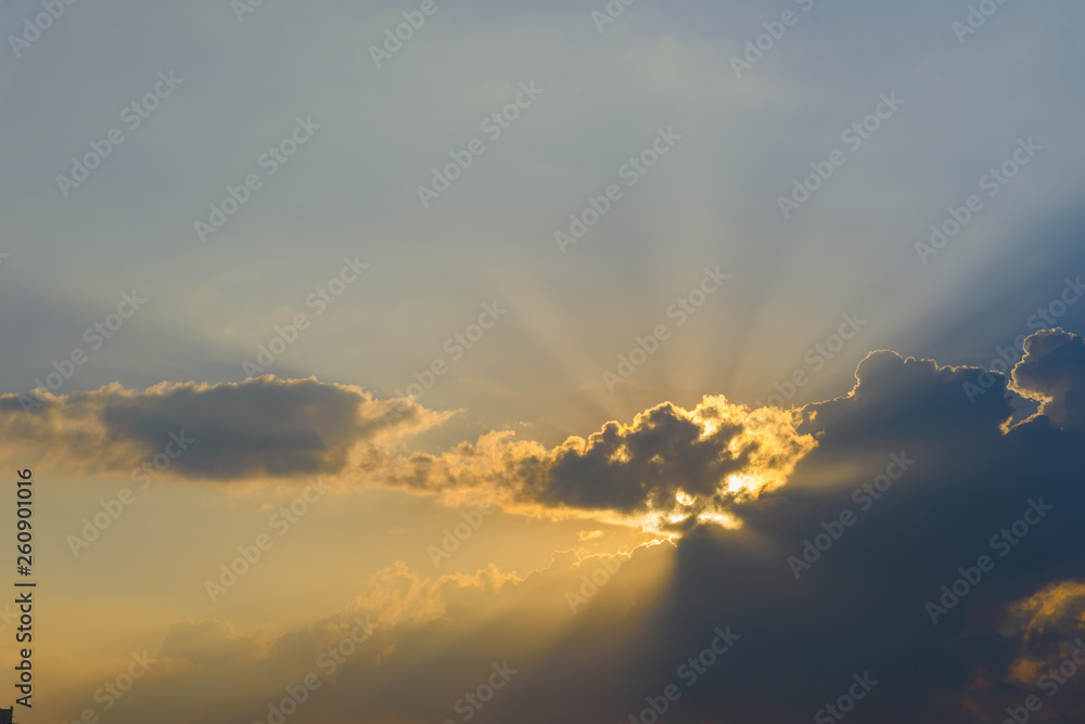 Beautiful dramatic sky clouds with light rays at sunset. Natural landscape for background Beautiful dramatic sky clouds with light rays at sunset. Natural landscape for background