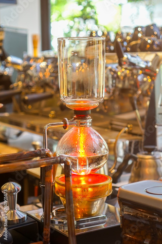 Siphon  Syphon  coffee maker is a vacuum coffee maker brews coffee using two chambers where vapor pressure and vacuum produce coffee.