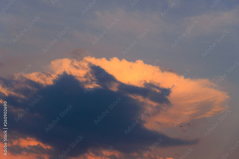 Dramatic cloudscape in the sky at sunset. Cloudy abstract background