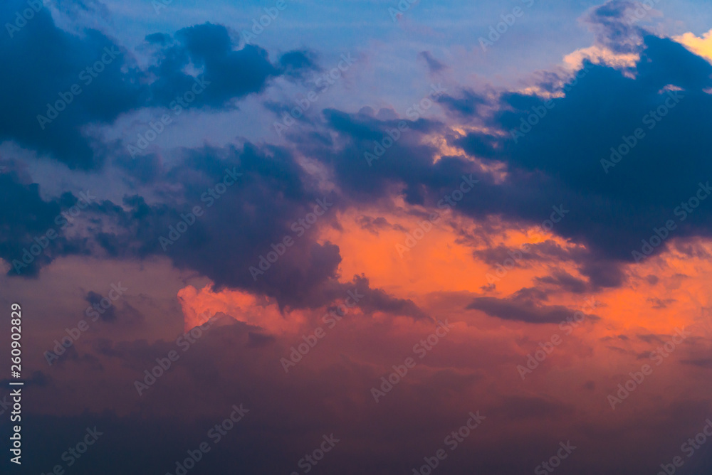 Dramatic cloudscape in the sky at sunset. Cloudy abstract background Dramatic cloudscape in the sky at sunset. Cloudy abstract background