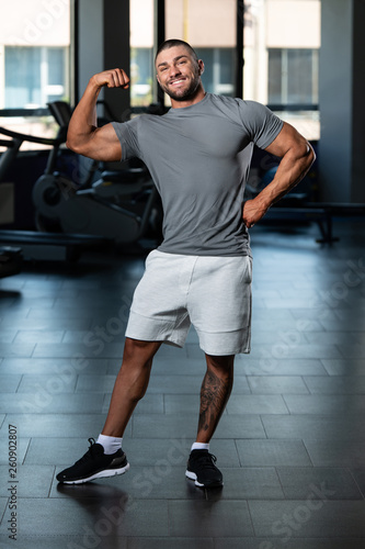 Healthy Man Posing In Gray T-shirt
