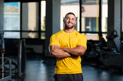Healthy Man Posing In Yellow T-shirt © Jale Ibrak