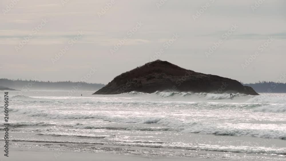 Surfing Incinerator Rock, Long Beach 4K UHD. Surfers at Incinerator Rock at Long Beach in Pacific Rim National Park. 4K, UHD. Surfing Incinerator Rock, Long Beach 4K UHD. Surfers at Incinerator Rock at Long Beach in Pacific Rim National Park. 4K, UHD.