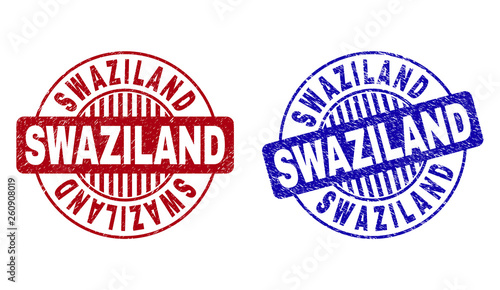 Grunge SWAZILAND round stamp seals isolated on a white background. Round seals with grunge texture in red and blue colors. Vector rubber imprint of SWAZILAND label inside circle form with stripes.