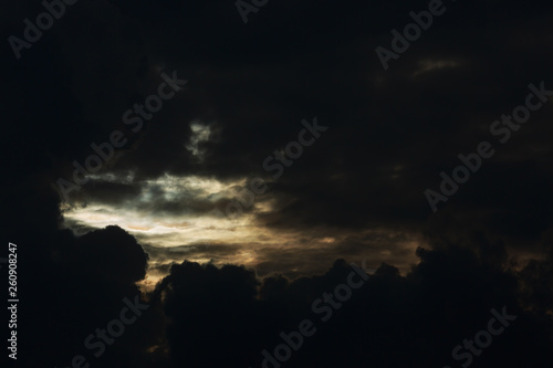 heaven light in dramatic sky with dark cloud