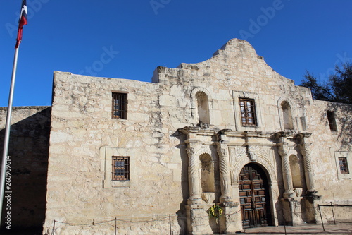 Remember the Alamo, Very historic beautiful stone construction and facade . bright blue sky .
